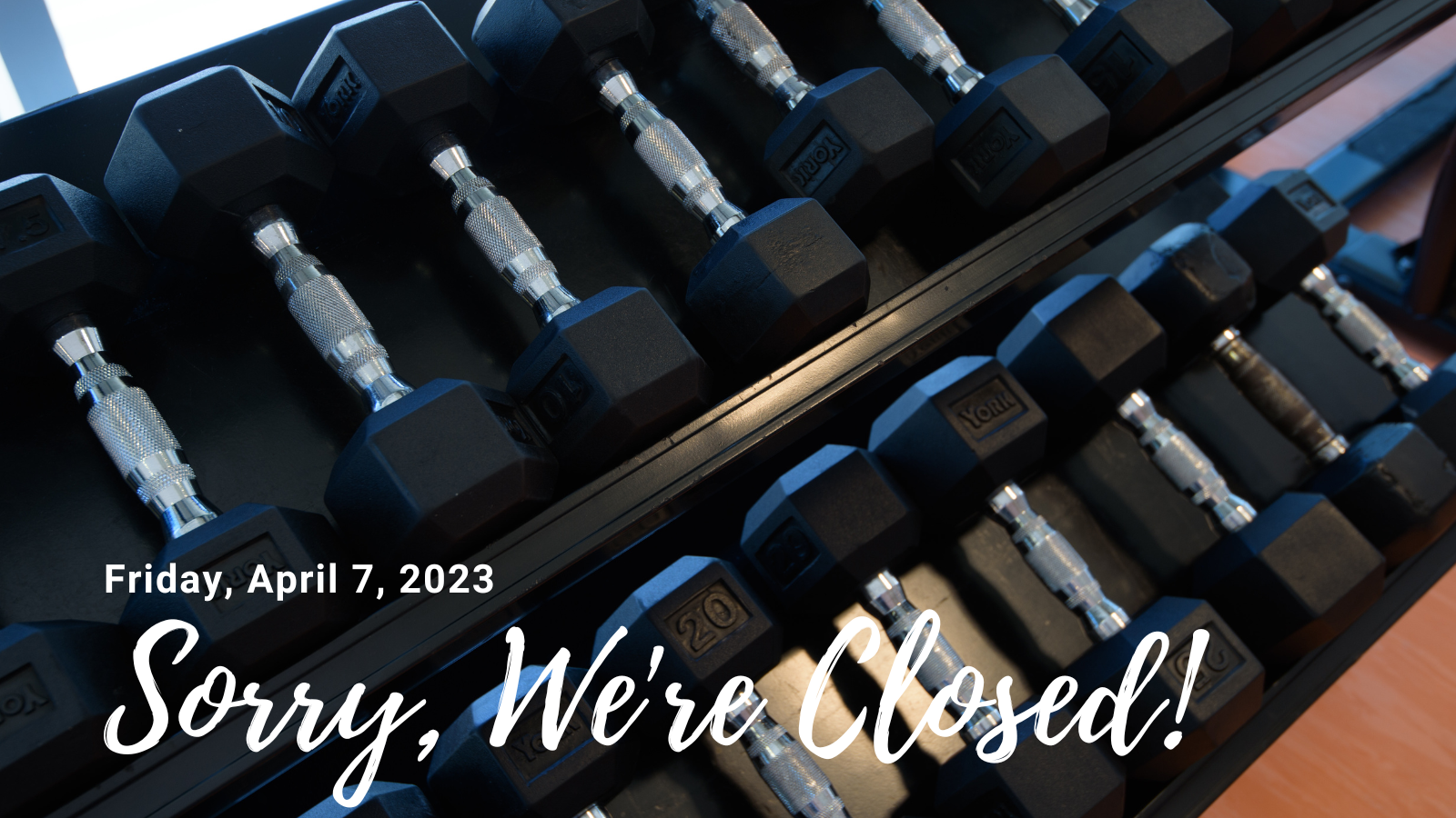 Text: Closed Friday April 7, 2023. Photo of rows of free weights.